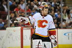 PITTSBURGH - MARCH 25:  Goaltender Miikka Kiprusoff #34 of the Calgary Flames takes a break in a game against the Pittsburgh Penguins on March 25, 2009 at Mellon Arena in Pittsburgh, Pennsylvania.  (Photo by Jamie Sabau/Getty Images)