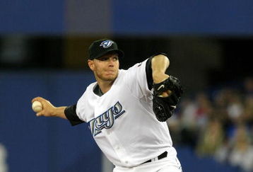TORONTO - APRIL 6:  Roy Halladay #32 of the Toronto Blue Jays throws a pitch against the Detroit Tigers during their MLB game at the Rogers Centre April 6, 2009 in Toronto, Ontario.(Photo By Dave Sandford/Getty Images)