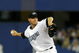 TORONTO - APRIL 6:  Roy Halladay #32 of the Toronto Blue Jays throws a pitch against the Detroit Tigers during their MLB game at the Rogers Centre April 6, 2009 in Toronto, Ontario.(Photo By Dave Sandford/Getty Images)