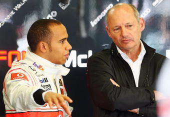 MELBOURNE, AUSTRALIA - MARCH 27:  Lewis Hamilton of Great Britain and McLaren Mercedes talks with McLaren CEO Ron Dennis in his team garage during practice for the Australian Formula One Grand Prix at the Albert Park Circuit on March 27, 2009 in Melbourne, Australia.  (Photo by Clive Mason/Getty Images)
