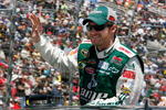 FORT WORTH, TX - APRIL 05:  Dale Earnhardt Jr., driver of the #88 National Guard/AMP Energy Chevrolet, waves to the crowd during driver intros for the NASCAR Sprint Cup Series Samsung 500 at Texas Motor Speedway on April 5, 2009 in Fort Worth, Texas.  (Photo by John Harrelson/Getty Images)
