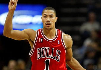 CHARLOTTE, NC - MARCH 03:  Derrick Rose #1 of the Chicago Bulls dribbles the ball against the Charlotte Bobcats during their game at Time Warner Cable Arena on March 3, 2009 in Charlotte, North Carolina. NOTE TO USER: User expressly acknowledges and agrees that, by downloading and/or using this Photograph, user is consenting to the terms and conditions of the Getty Images License Agreement.  (Photo by Streeter Lecka/Getty Images)