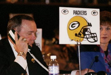 19 Apr 1998:  A representative of the Green Bay Packers talks on the phone during the second day of the 1998 NFL Draft at Madison Square Garden in Manhattan, New York. Mandatory Credit: Ezra C. Shaw  /Allsport