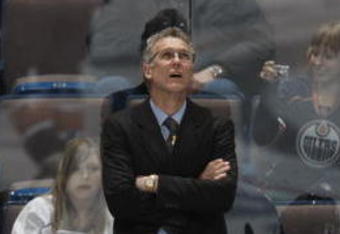 EDMONTON, CANADA - JANUARY 11: Head Coach Craig MacTavish of the Edmonton Oilers looks up at the scoreboard against the St. Louis Blues on January 11, 2009 at Rexall Place in Edmonton, Alberta, Canada. (Photo by Dale MacMillan/Getty Images)