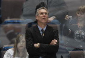 EDMONTON, CANADA - JANUARY 11: Head Coach Craig MacTavish of the Edmonton Oilers looks up at the scoreboard against the St. Louis Blues on January 11, 2009 at Rexall Place in Edmonton, Alberta, Canada. (Photo by Dale MacMillan/Getty Images)