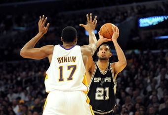 LOS ANGELES, CA - JANUARY 25:  Tim Duncan #21 of the San Antonio Spurs shoots the ball over Andrew Bynum #17 of the Los Angeles Lakers during the game at the Staples Center on January 25, 2009 in Los Angeles, California.  The Lakers defeated the Spurs 99-85.  NOTE TO USER:  User expressly acknowledges and agrees that, by downloading and/or using this photograph, User is consenting to the terms and conditions of the Getty Images License Agreement.  (Photo by Harry How/Getty Images)