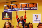 UNIONDALE, NY - MARCH 26:  A fan who identified himself as Lou of Massapequa shows his support for the Lighthouse project during the Lighthouse Development's 180th Community Outreach Meeting at the Marriott's Hotel Grand Ballroom March 26, 2009 in Uniondale, New York.  (Photo by Mike Stobe/Getty Images)