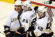 GLENDALE, AZ - APRIL 11: (L-R) Teemu Selanne #8, Erik Christensen #26 and Andrew Ebbett #48 of the Anaheim Ducks celebrate after Christensen scored a second period power play goal against the Phoenix Coyotes during the NHL game at Jobing.com Arena on April 11, 2009 in Glendale, Arizona. (Photo by Christian Petersen/Getty Images)