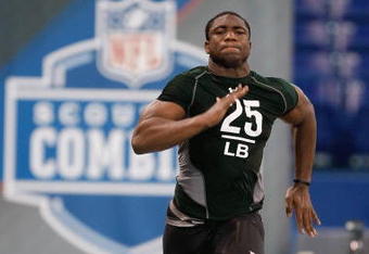 INDIANAPOLIS, IN - FEBRUARY 23:  Linebacker Clint Sintim of Virginia runs the 40 yard dash during the NFL Scouting Combine presented by Under Armour at Lucas Oil Stadium on February 23, 2009 in Indianapolis, Indiana. (Photo by Scott Boehm/Getty Images)