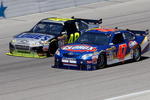 FORT WORTH, TX - APRIL 05:  Jimmie Johnson, driver of the #48 Kobalt Tools Chevrolet, races Marcos Ambrose, driver of the #47 Clorox Toyota, during the NASCAR Sprint Cup Series Samsung 500 at Texas Motor Speedway on April 5, 2009 in Fort Worth, Texas.  (Photo by John Harrelson/Getty Images)