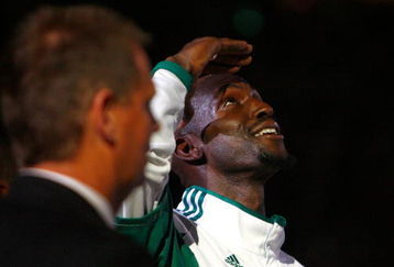 BOSTON, MA - OCTOBER 28: President Danny Ainge and Kevin Garnett  #5 of the Boston Celtics watch as the 2008 World Championship banner is raised during the 2008 NBA World Championship ceremony before a game against the Cleveland Cavaliers at the TD Banknorth Garden on October 28, 2008 in Boston, Massachusetts. NOTE TO USER: User expressly acknowledges and agrees that, by downloading and/or using this Photograph, user is consenting to the terms and conditions of the Getty Images License Agreement. (Photo by Jim Rogash/Getty Images)