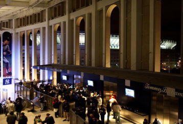 NEW YORK - APRIL 03:  The old Yankee Stadium is seen through the pillars of the Great Hall during the New York Yankees game against the Chicago Cubs at Yankee Stadium on April 3, 2009 in the Bronx borough of New York City.  (Photo by Ezra Shaw/Getty Images)