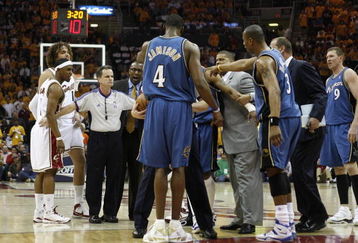 CLEVELAND - APRIL 30:  Head coach Eddie Jordan of the Washington Wizards holds back Antawn Jamison #4 and Caron Butler #3 during an altercation during action against the Cleveland Cavaliers in Game Five of the Eastern Conference Quarterfinals during the 2008 NBA Playoffs at Quicken Loans Arena on April 30, 2008 in Cleveland, Ohio.  NOTE TO USER: User expressly acknowledges and agrees that, by downloading and or using this photograph, User is consenting to the terms and conditions of the Getty Images License Agreement.  (Photo by Gregory Shamus/Getty Images)