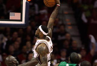 CLEVELAND - MAY 12:  LeBron James #23 of the Cleveland Cavaliers dunks over Kevin Garnett #5 of the Boston Celtics in Game Four of the 2008 NBA Eastern Conference Semifinals on May 12, 2008 at the Quicken Loans Arena in Cleveland, Ohio. Cavaliers won 88-77.  NOTE TO USER: User expressly acknowledges and agrees that, by downloading and or using this photograph, User is consenting to the terms and conditions of the Getty Images License Agreement.  (Photo by Gregory Shamus/Getty Images)