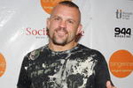 LAS VEGAS - OCTOBER 06:  UFC light heavyweight champion Chuck Liddell arrives at the Tangerine Lounge & Nightclub at the Treasure Island Hotel & Casino during the club's two-year anniversary party and the grand opening of the Social House restaurant October 6, 2006 in Las Vegas, Nevada.  (Photo by Ethan Miller/Getty Images)