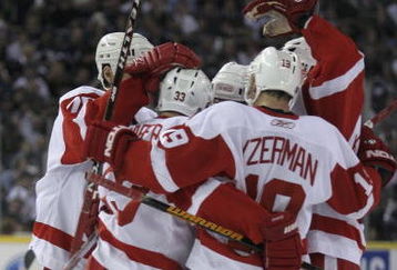 EDMONTON, AB - April 25: Jason Williams #29, Kris Draper #33, Steve Yzerman #19, Niklas Kronwall #55 and Mathieu Schneider #23 of the Detroit Red Wings celebrate a goal by Schneider to tie up the game at 3-3 during third period action against the Edmonton Oilers in game three of the Western Conference Quarterfinals on April 25, 2006 at Rexall Place in Edmonton, Alberta, Canada.  (Photo by Tim Smith/Getty Images)