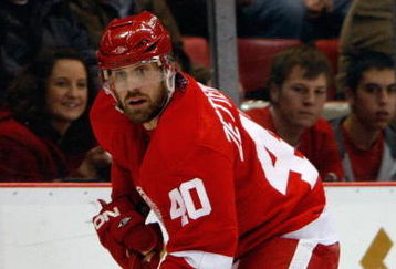 DETROIT - MARCH 12:  Henrik Zetterberg #40 of the Detroit Red Wings skates against the Calgary Flames during the game on March 12, 2009 at Joe Louis Arena in Detroit, Michigan. (Photo by Gregory Shamus/Getty Images)