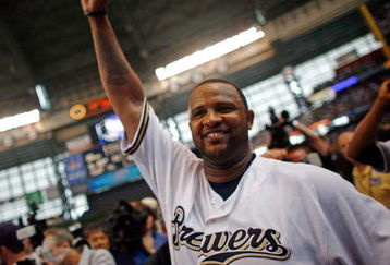 MILWAUKEE - SEPTEMBER 28:  Starting pitcher CC Sabathia of the Milwaukee Brewers pumps his fist after pitching a complete game as they celebrate clinching the National League Wild Card against the Chicago Cubs at Miller Park on September 28, 2008 in Milwaukee, Wisconsin. The Brewers defeated the Cubs 3-1.  (Photo by Darren Hauck/Getty Images)