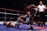 MANCHESTER, UNITED KINGDOM - SEPTEMBER 06:  Amir Khan (L) is knocked out in the first round by Breidis Prescott during Lightweight WBO Inter continental title fight on September 6, 2008 at MEN arena Manchester, England.  (Photo by John Gichigi/Getty Images)