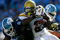 CHAPEL HILL, NC - NOVEMBER 08:  Running back Jonathan Dwyer #21 of the Georgia Tech Yellow Jackets runs into Marvin Austin #9 of the North Carolina Tar Heels during the game at Kenan Stadium on November 8, 2008 in Chapel Hill, North Carolina.  (Photo by Kevin C. Cox/Getty Images)
