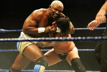 SYDNEY, AUSTRALIA - JUNE 15:  Shelton Benjamin puts CM Punk into a headlock during WWE Smackdown at Acer Arena on June 15, 2008 in Sydney, Australia.  (Photo by Gaye Gerard/Getty Images)