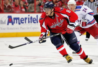 WASHINGTON - APRIL 15:  Alex Ovechkin #8 of the Washington Capitals skates the puck against the New York Rangers during Game One of the Eastern Conference Quarterfinals of the 2009 NHL Stanley Cup Playoffs on April 15, 2009 at the Verizon Center in Washington, DC.  (Photo by Len Redkoles/Getty Images)