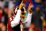 LANDOVER, MD - DECEMBER 21:  Quarterback Jason Campbell #17 of the Washington Redskins reacts after scoring a touchdown against the Philadelphia Eagles during the game on December 21, 2008 at FedEx Field in Landover, Maryland.  (Photo by Kevin C. Cox/Getty Images)