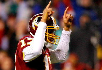 LANDOVER, MD - DECEMBER 21:  Quarterback Jason Campbell #17 of the Washington Redskins reacts after scoring a touchdown against the Philadelphia Eagles during the game on December 21, 2008 at FedEx Field in Landover, Maryland.  (Photo by Kevin C. Cox/Getty Images)