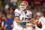 MIAMI - JANUARY 08:  Tim Tebow #15 of the Florida Gators looks to pass the ball during the FedEx BCS National Championship Game against the Oklahoma Sooners at Dolphin Stadium on January 8, 2009 in Miami, Florida.  (Photo by Donald Miralle/Getty Images)