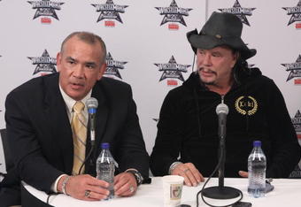 HOUSTON, TX - APRIL 5:  (L-R) Former professional wrestler Ricky 'The Dragon' Steamboat looks on as actor Mickey Rourke discusses his wishes to not get involved in a match with WWE Superstar Chris Jericho during a press conference before WrestleMania 25 at Reliant Stadium on April 5, 2009 in Houston, Texas.  (Photo by Bill Olive/Getty Images)