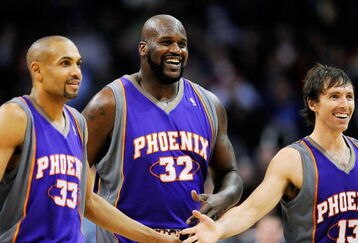 LOS ANGELES, CA - FEBRUARY 18:  Shaquille O'Neal #32 of the Phoenix Suns is congratualted by his teammate Steve Nash #13 and Grant Hill #33 during the basketball game against the Los Angeles Clippers during the second quarter at the Staples Center on February 18, 2009 in Los Angeles, California. NOTE TO USER: User expressly acknowledges and agrees that, by downloading and or using this photograph, User is consenting to the terms and conditions of the Getty Images License Agreement.  (Photo by Kevork Djansezian/Getty Images)