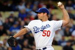 LOS ANGELES, CA - APRIL 16:  Eric Stults #50 of the Los Angeles Dodgers pitches against the San Francisco Giants during the first inning at Dodger Stadium on April 16, 2009 in Los Angeles, California.  (Photo by Harry How/Getty Images)