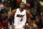 MIAMI - DECEMBER 12:  Dwyane Wade #3 of the Miami Heat reacts after being called for a foul late in the game against the Atlanta Hawks at American Airlines Arena on December 12, 2008 in Miami, Florida. The Hawks defeated the Heat 87-73. NOTE TO USER: User expressly acknowledges and agrees that, by downloading and/or using this Photograph, user is consenting to the terms and conditions of the Getty Images License Agreement.  (Photo by Doug Benc/Getty Images)