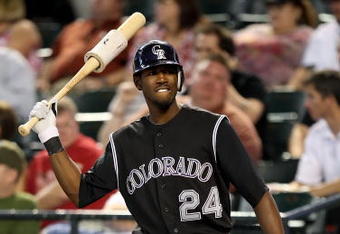 PHOENIX - APRIL 08:  Dexter Fowler #24 of the Colorado Rockies prepares to bat against the Arizona Diamondbacks during the game at Chase Field on April 8, 2009 in Phoenix, Arizona.  (Photo by Christian Petersen/Getty Images)
