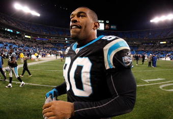 CHARLOTTE, NC - DECEMBER 08:  Julius Peppers #90 of the Carolina Panthers walks off the field after a victory over the Tampa Bay Buccaneers at Bank of America Stadium on December 8, 2008 in Charlotte, North Carolina.  (Photo by Streeter Lecka/Getty Images)