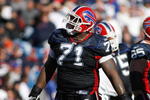 ORCHARD PARK - OCTOBER 19:  Jason Peters #71 of the Buffalo Bills walks on the field during the game against the San Diego Chargers on October 19, 2008 at Ralph Wilson Stadium in Orchard Park, New York. The Bills defeated Chargers 23-14.  (Photo by: Rick Stewart/Getty Images)