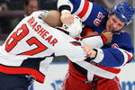 NEW YORK - FEBRUARY 11:  Colton Orr #28 of the New York Rangers fights with Donald Brashear #87 of the Washington Capitals on February 11, 2009 at Madison Square Garden in New York City, New York.  (Photo by Nick Laham/Getty Images)