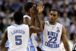DETROIT - APRIL 06:  (L-R) Ty Lawson #5 and Wayne Ellington #22 of the North Carolina Tar Heels celebrate a play in the first half againnst the Michigan State Spartans during the 2009 NCAA Division I Men's Basketball National Championship game at Ford Field on April 6, 2009 in Detroit, Michigan.  (Photo by Andy Lyons/Getty Images)