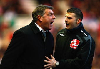 MIDDLESBROUGH, UNITED KINGDOM - JANUARY 31:   Sam Allardyce, the Blackburn manager, is restrained by the fourth official during the Barclays Premier League match between Middlesbrough and Blackburn Rovers at the Riverside Stadium on January 31, 2009 in Middlesbrough, England.  (Photo by Mark Thompson/Getty Images)