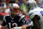 IRVING, TX - OCTOBER 14:  Quarterback Tom Brady #12 of the New England Patriots drops back to pass against the Dallas Cowboys at Texas Stadium on October 14, 2007 in Irving, Texas.  (Photo by Ronald Martinez/Getty Images)