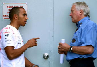 MONTREAL - JUNE 09:  Lewis Hamilton of Great Britain and McLaren Mercedes (L) and Charlie Whiting, FIA Formula One Race Director talk before qualifying for the Canadian Formula One Grand Prix at the Circuit Gilles Villeneuve on June 9, 2007 in Montreal, Canada.  (Photo by Mark Thompson/Getty Images)