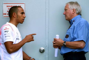 MONTREAL - JUNE 09:  Lewis Hamilton of Great Britain and McLaren Mercedes (L) and Charlie Whiting, FIA Formula One Race Director talk before qualifying for the Canadian Formula One Grand Prix at the Circuit Gilles Villeneuve on June 9, 2007 in Montreal, Canada.  (Photo by Mark Thompson/Getty Images)
