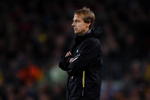 BARCELONA, SPAIN - APRIL 08:  Coach Juergen Klinsmann of Bayern Munich follows his players during the UEFA Champions League quarter final first leg match between FC Barcelona and FC Bayern Munich at the Camp Nou stadium on April 8, 2009 in Barcelona, Spain. Barcelona won the match 4-0.  (Photo by Jasper Juinen/Getty Images)