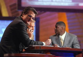 NEW YORK - APRIL 28:  Mel Kiper, Chris Mortensen and Keyshawn Johnson broadcast for ESPN during the 2007 NFL Draft on April 28, 2007 at Radio City Music Hall in New York, New York. (Photo by Chris McGrath/Getty Images)