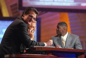 NEW YORK - APRIL 28:  Mel Kiper, Chris Mortensen and Keyshawn Johnson broadcast for ESPN during the 2007 NFL Draft on April 28, 2007 at Radio City Music Hall in New York, New York. (Photo by Chris McGrath/Getty Images)