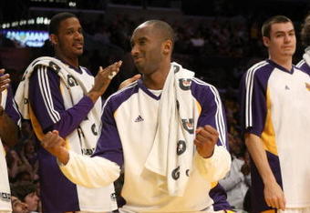 LOS ANGELES - APRIL 12: Kobe Bryant #24 of the Los Angeles Lakers celebrates at the bench during the game with the Memphis Grizzlies on April 12, 2009 at Staples Center in Los Angeles, California. The Lakers won 92-75. NOTE TO USER: User expressly acknowledges and agrees that, by downloading and/or using this Photograph, user is consenting to the terms and conditions of the Getty Images License Agreement. (Photo by Stephen Dunn/Getty Images)