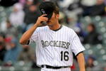 DENVER - APRIL 12:  Pitcher Huston Street #16 of the Colorado Rockies reacts as he returns to the mound as he pitches in the ninth inning against the Philadelphia Phillies at Coors Field on April 12, 2009 in Denver, Colorado. Street gave up the game winning homerun to Matt Stairs and collected the loss as the Phillies defeated the Rockies 7-5.  (Photo by Doug Pensinger/Getty Images)