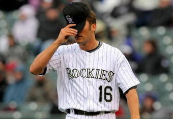 DENVER - APRIL 12:  Pitcher Huston Street #16 of the Colorado Rockies reacts as he returns to the mound as he pitches in the ninth inning against the Philadelphia Phillies at Coors Field on April 12, 2009 in Denver, Colorado. Street gave up the game winning homerun to Matt Stairs and collected the loss as the Phillies defeated the Rockies 7-5.  (Photo by Doug Pensinger/Getty Images)