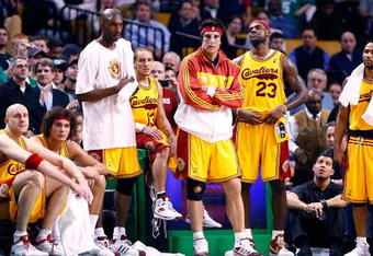 BOSTON, MA - MARCH 6: LeBron James #23 of the Cleveland Cavaliers his teammates watch the final moments of a game from the bench against the Boston Celtics at the TD Banknorth Garden on March 6, 2009 in Boston, Massachusetts. The Celtics won 105-94. NOTE TO USER: User expressly acknowledges and agrees that, by downloading and/or using this Photograph, user is consenting to the terms and conditions of the Getty Images License Agreement. (Photo by Jim Rogash/Getty Images)