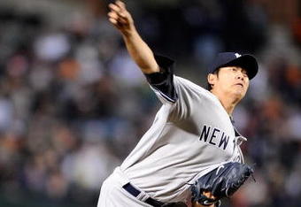 BALTIMORE - APRIL 8:  Chien-Ming Wang #40 of the New York Yankees pitches against the Baltimore Orioles at Camden Yards April 8, 2009 in Baltimore, Maryland.  (Photo by Greg Fiume/Getty Images)